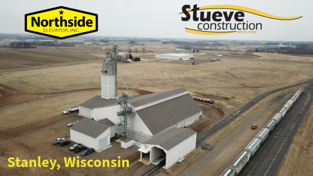 Dry Fertilizer Building for Northside Elevator in Stanley Wisconsin with rail cars