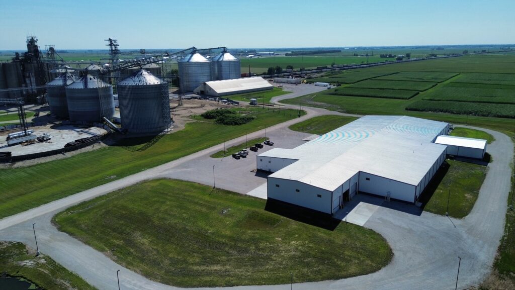 Landus Coop liquid fertilizer and ag chemical mixing facility surrounded by crop fields