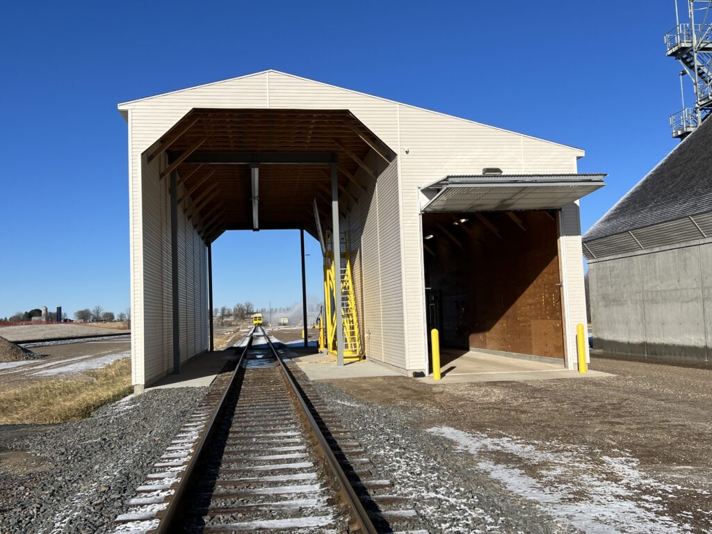 Covered Rail and truck receiving building that loads dry fertilizer into the blending plant