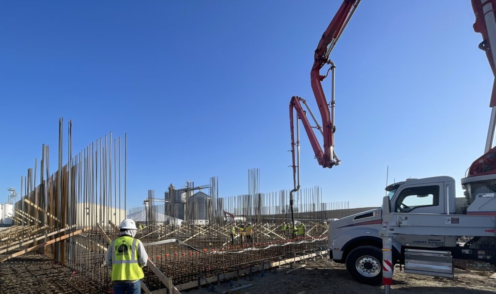 Pumping concrete in Nebraska for a fertilizer building under construction by Stueve