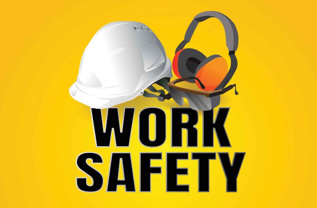 Construction workplace safety sign shows hard hat and hearing protection