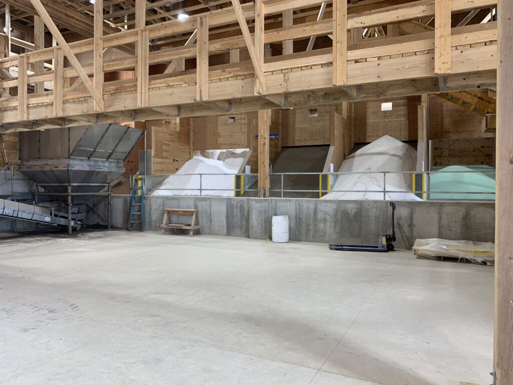 Fertilizer product bins at dry new crop nutrient facility