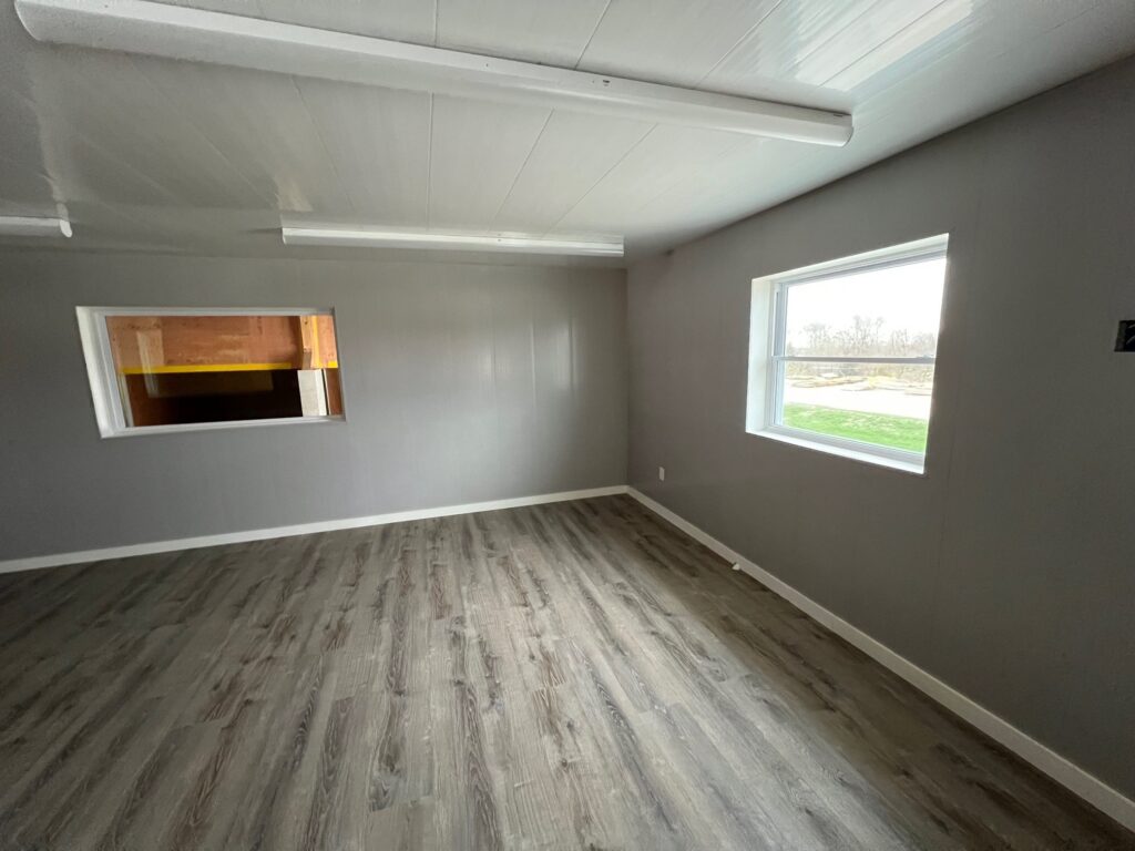 Dry fertilizer building office with trusscore wall and ceiling panels