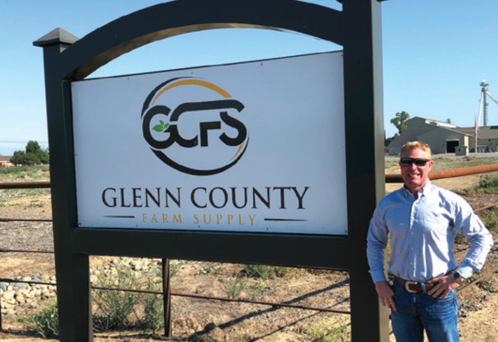 sign and owner of Glenn County farm supply fertilizer building