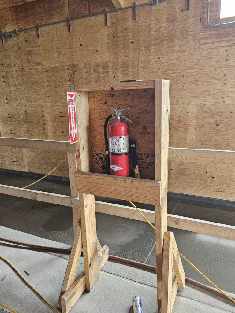 Fire extinguisher on fertilizer building construction job site