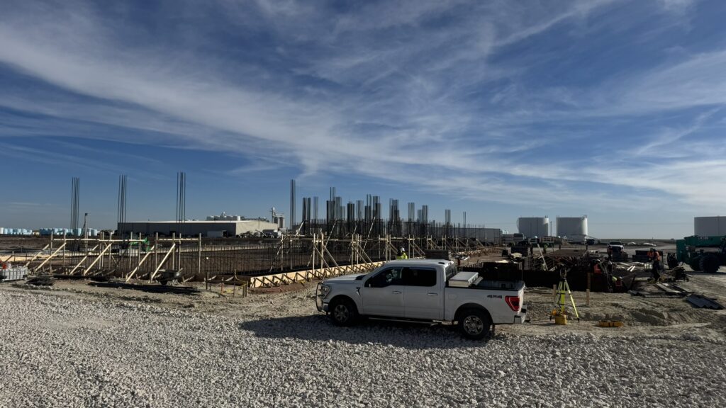 dry fertilizer building construction with truck and workers